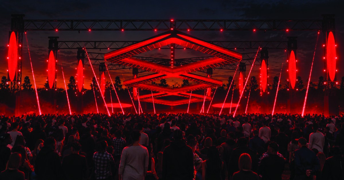 Creamfields Runway 2.0 stage lit red with diamond structures over the crowd