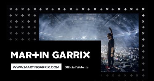 Martin Garrix on stage in front of an arena crowd