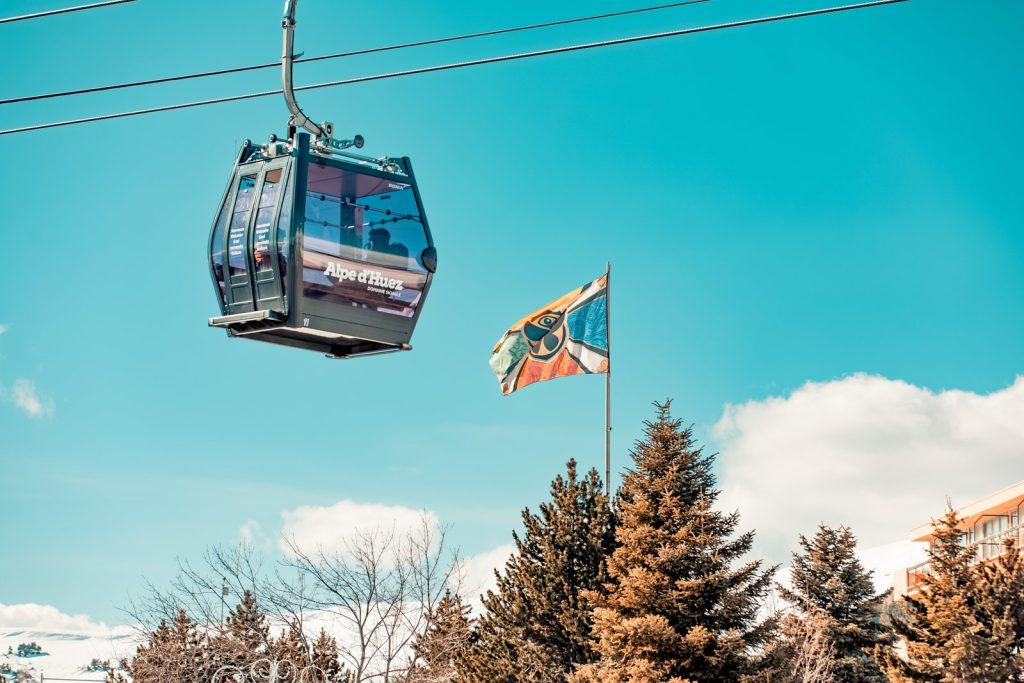 Alpe d'Huez gondola with a Tomorrowland flag